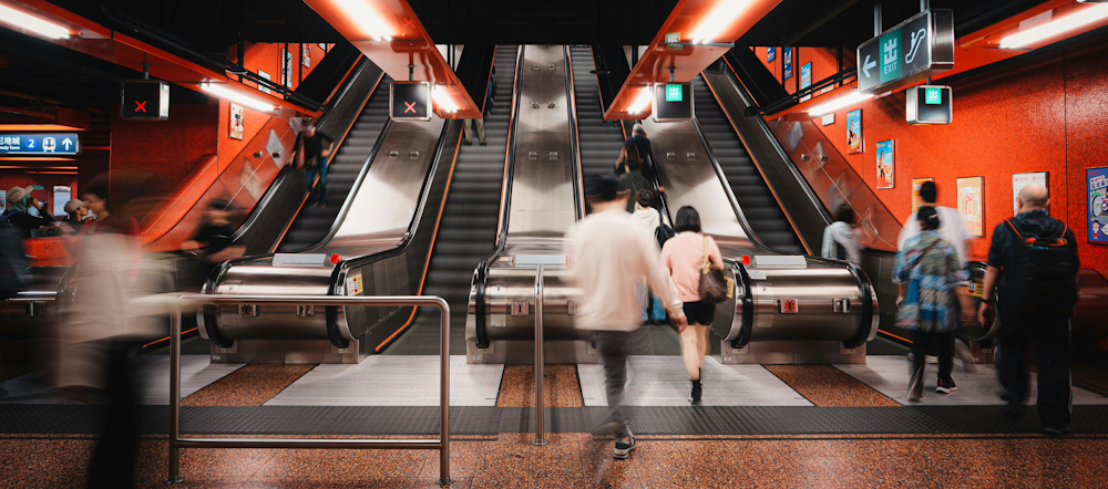 Tin Hau MTR Station Escalator by Jason Yuen on Unsplash