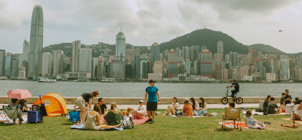 Diverse Picnic in West Kowloon Cultural District in Hong Kong by Raymond Yeung on Unsplash