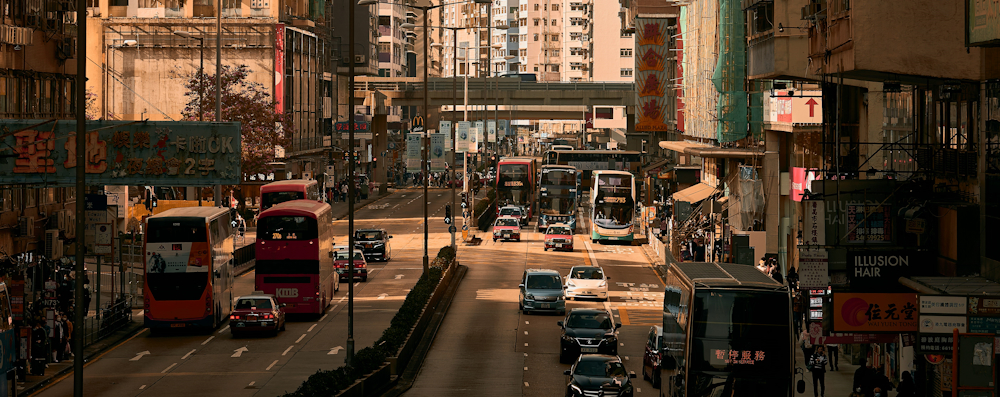 Busy street traffic in Hong Kong by Jun Huang on Unsplash