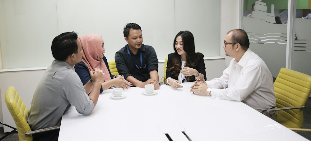 Indonesian Office Meeting by Edi Kurniawan on Unsplash