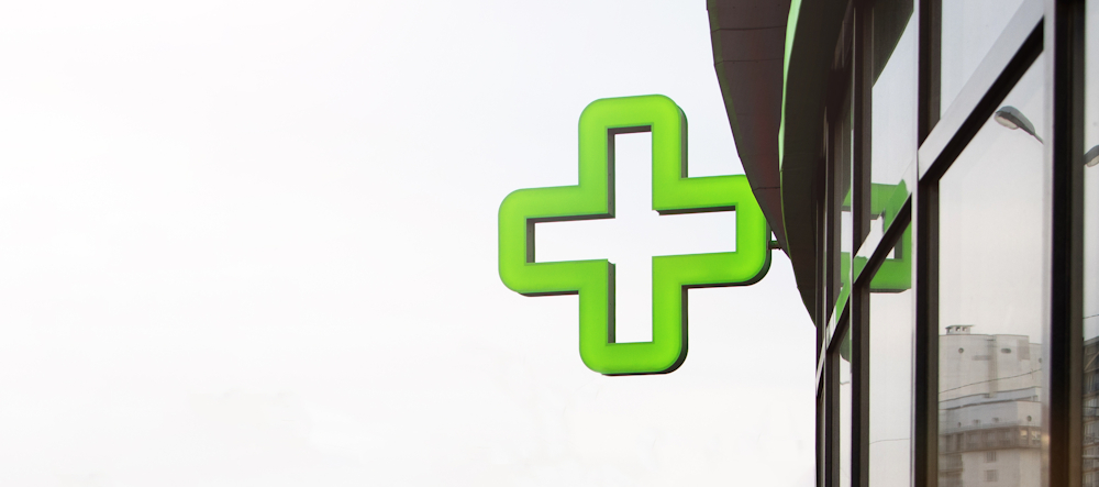 green pharmacy sign